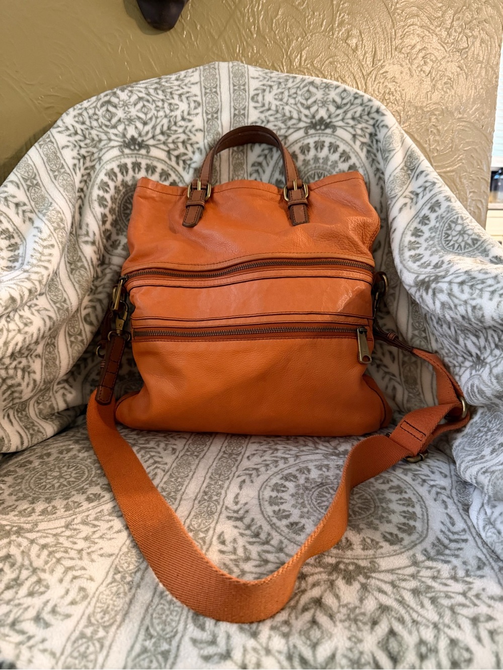 Fossil Explorer Fold Over Tote in orange on brass hardware